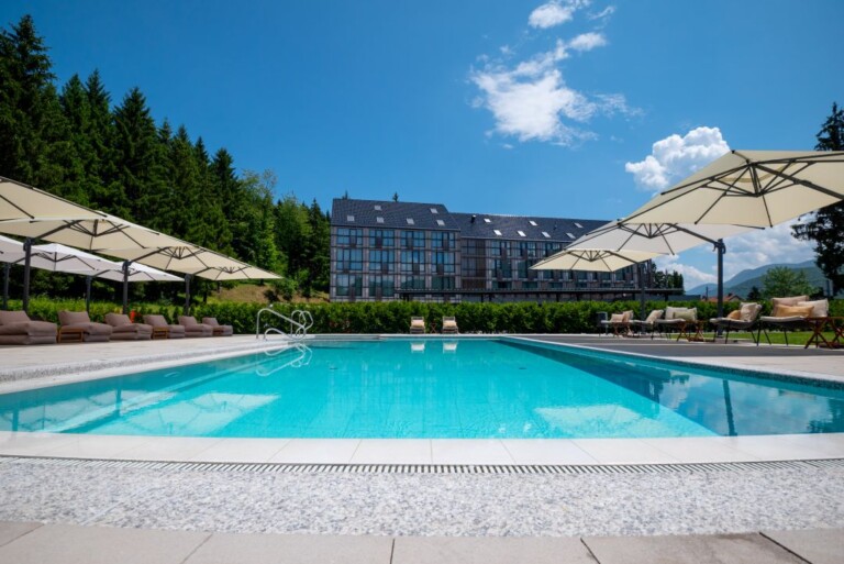 Lyra Hotel Plitvice outdoor pool surrounded by forest Lyra Hotel Plitvice outdoor pool surrounded by forest